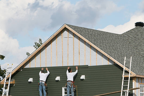 Professional Siding Contractor technician working in Tomball, TX